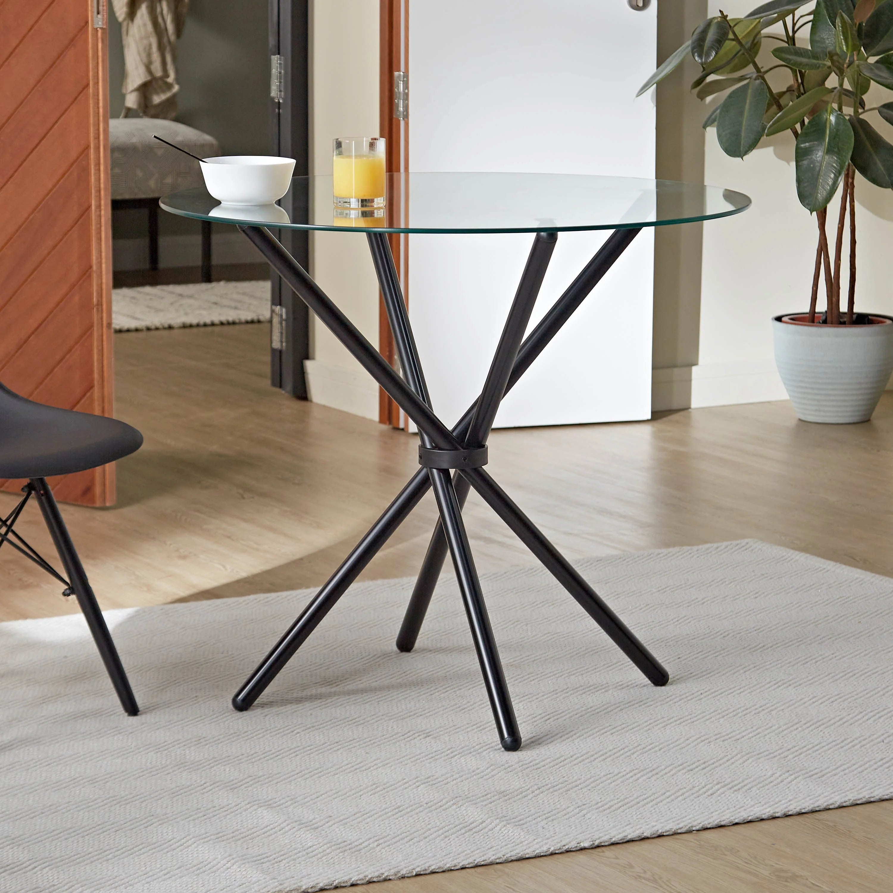 Velets Bella Round Glass Top Dining Table with Black Legs